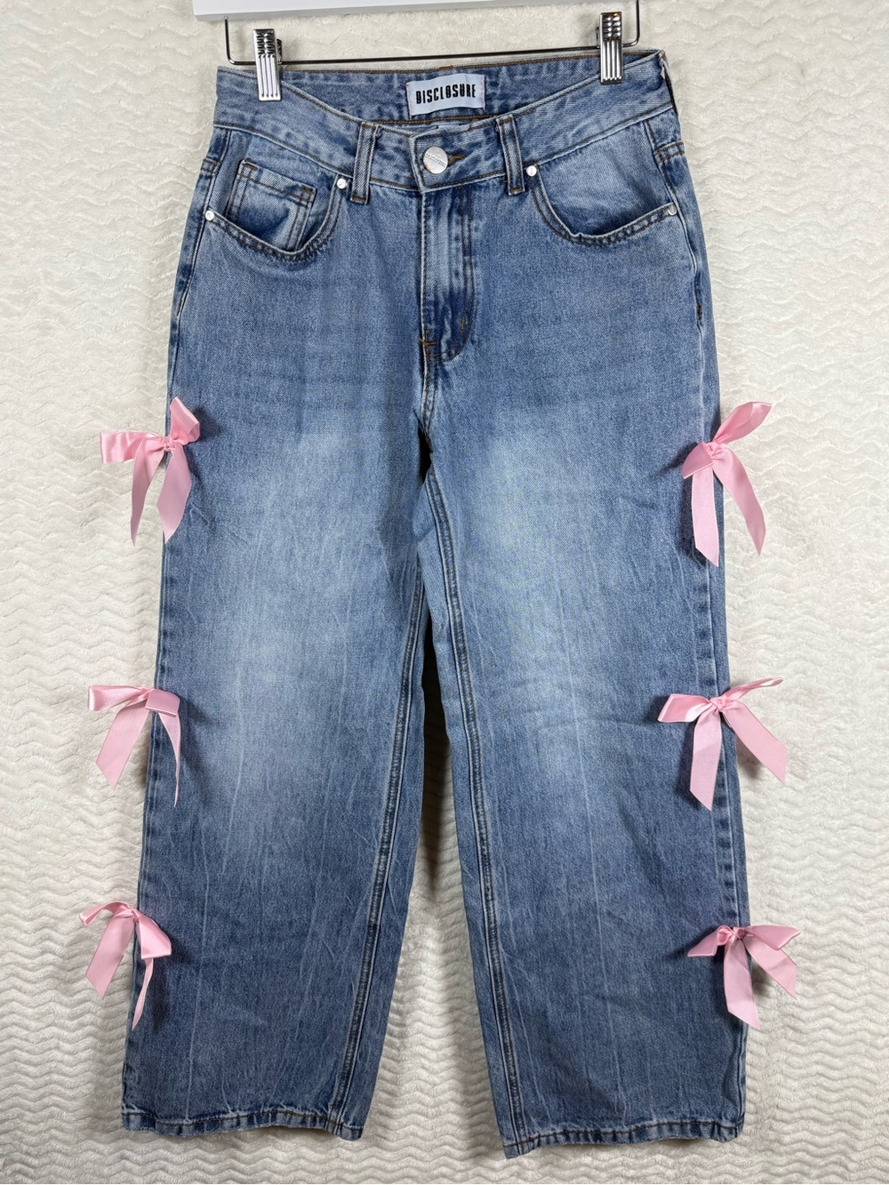 Disclosure Pink Ribbon-Trim light wash wide-leg Blue Jeans for Women